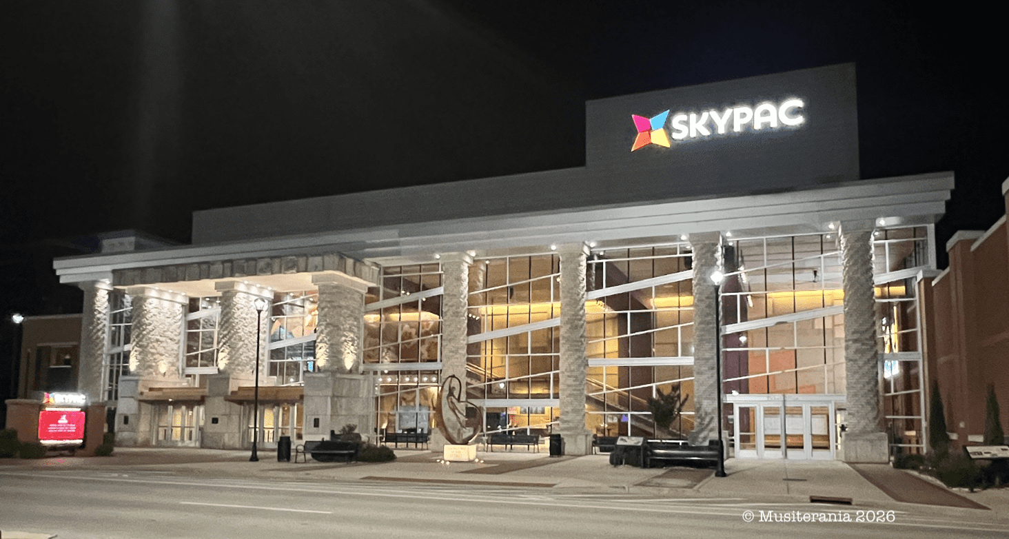 SKYPAC building lit up at night