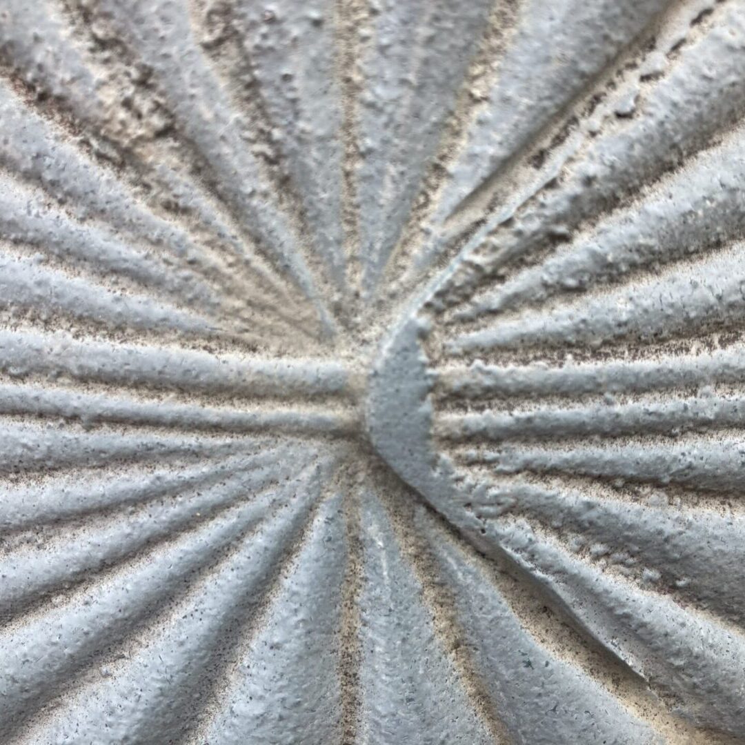A stone etched with patterns