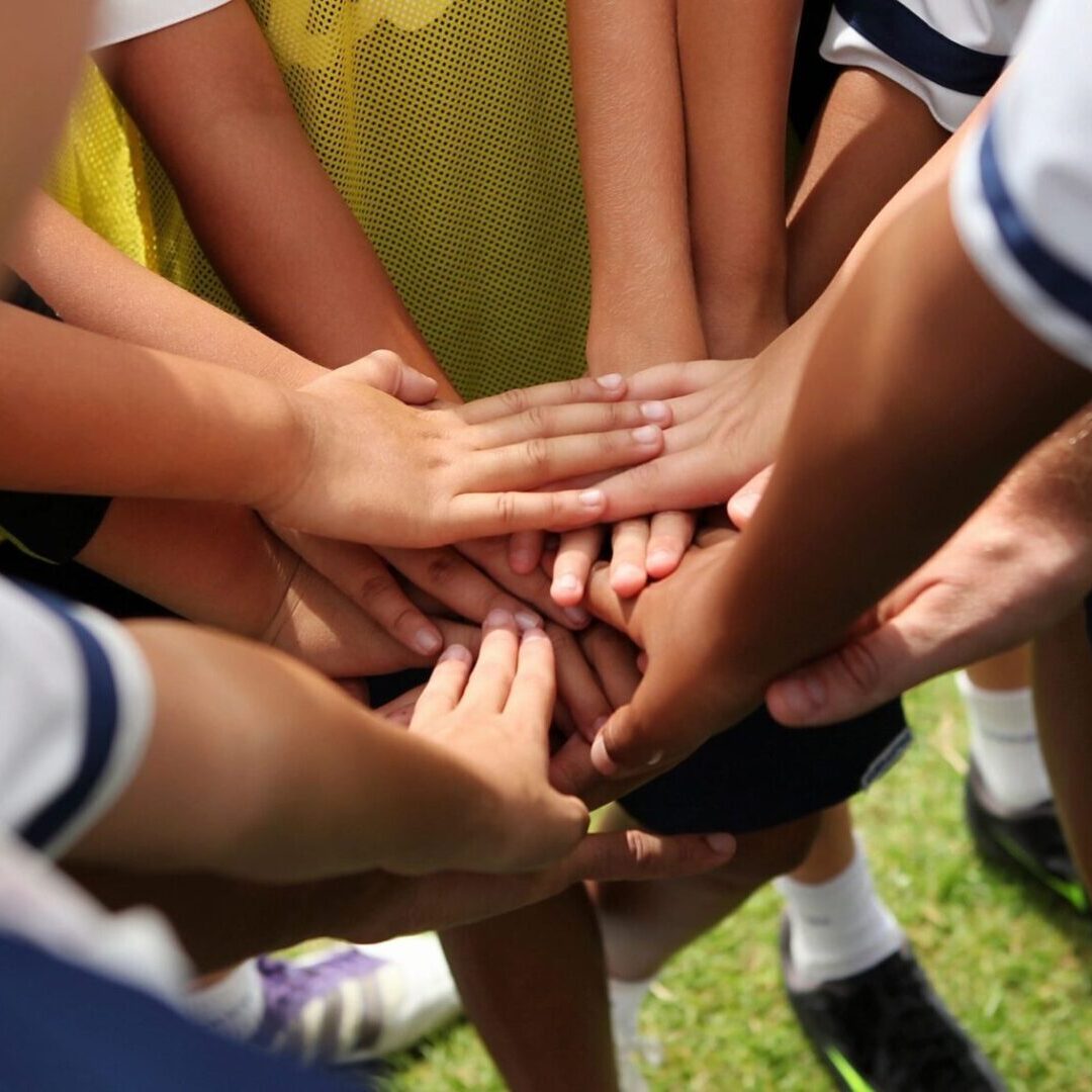 Children huddling in agreement