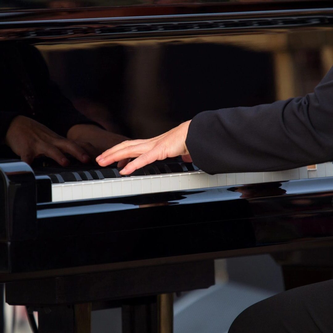 A person playing a piano